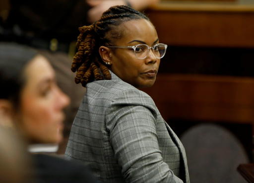 Former Richneck Elementary School assistant principal Ebony Parker looks back into the courtroom during Abby Zwerner's lawsuit against her Tuesday, Oct. 28, 2025, in Newport News, Va. (Stephen M. Katz/The Virginian-Pilot via AP, Pool) Former Richneck Elementary School assistant principal Ebony Parker looks back into the courtroom during Abby Zwerner's lawsuit against her Tuesday, Oct. 28, 2025, in Newport News, Va. (Stephen M. Katz/The Virginian-Pilot via AP, Pool)