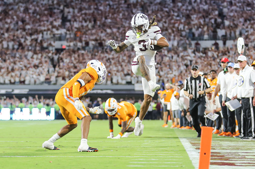 Mississippi State wide receiver Anthony Evans III (3) attempts to hurdled Tennessee defensive back Jalen McMurray (6) during the overtime of an NCAA college football game in Starkville, Miss., Saturday, Sept. 27, 2025. (AP Photo/James Pugh) Mississippi State wide receiver Anthony Evans III (3) attempts to hurdled Tennessee defensive back Jalen McMurray (6) during the overtime of an NCAA college football game in Starkville, Miss., Saturday, Sept. 27, 2025. (AP Photo/James Pugh)