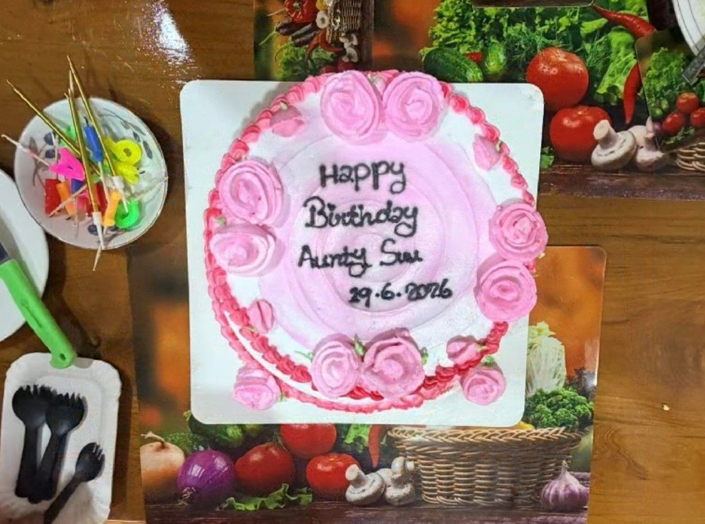 In this photo released by Myanmar President Office on Monday, Aug. 3, 2026, a birthday cake for Myanmar ousted leader Aung San Suu Kyi is seen during her meeting with Arnaud de Baecque, resident representative of the International Committee of the Red Cross, in Naypyitaw, Myanmar. (Myanmar President Office via AP)