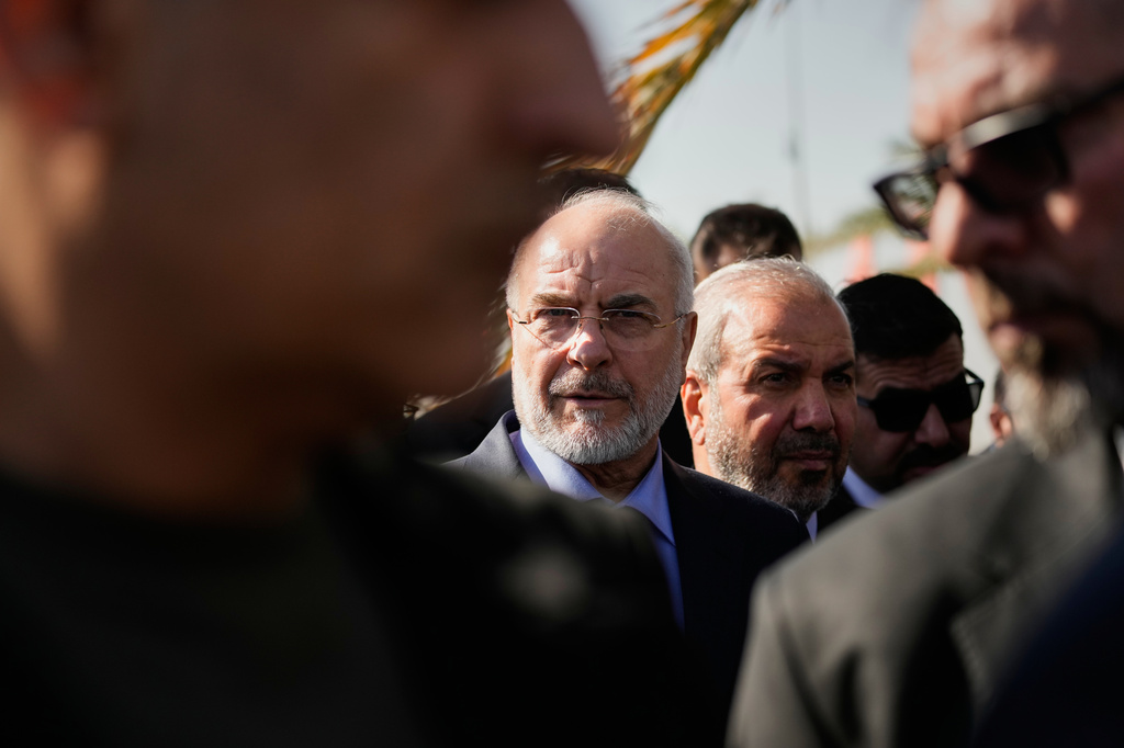 Iranian Parliament Speaker Mohammad Bagher Qalibaf visits the site where Iranian Gen. Qassem Soleimani was killed in a U.S. drone strike near Baghdad International Airport, during an official visit to Baghdad, Iraq, Wednesday, Aug. 19, 2026.(AP Photo/Hadi Mizban)