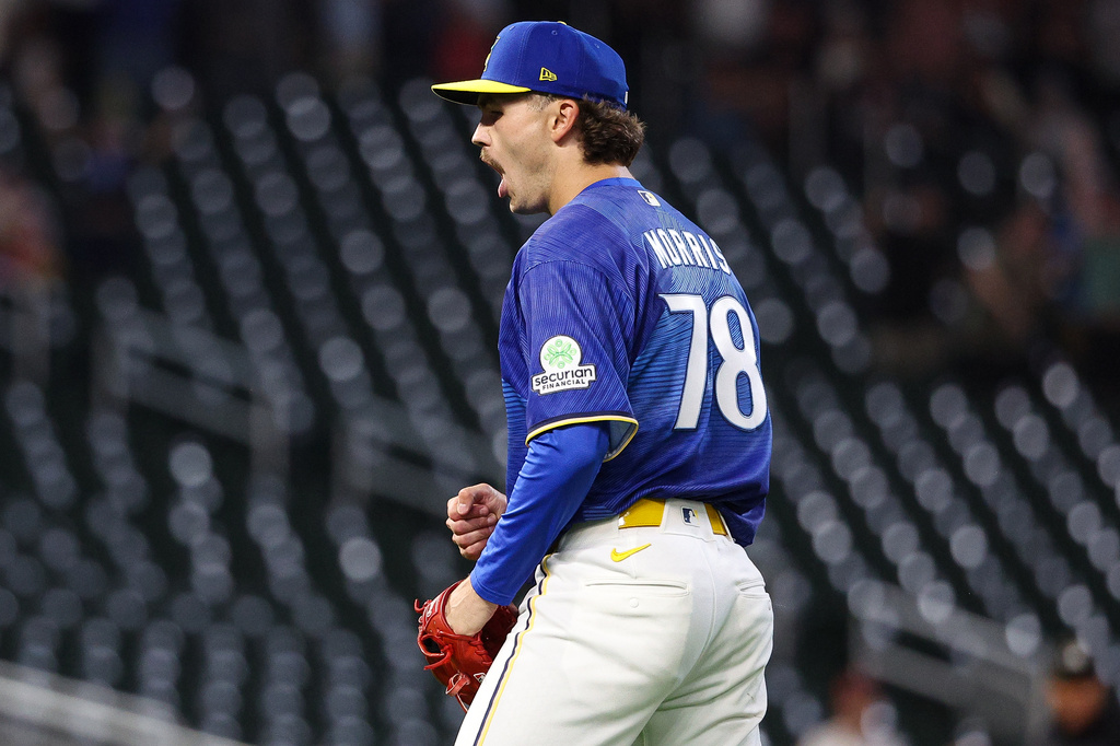 Minnesota Twins pitcher Andrew Morris celebrates his teams win against the St. Louis Cardinals during the ninth inning of a baseball game, Friday, June 12, 2026, in Minneapolis. (AP Photo/Matt Krohn)