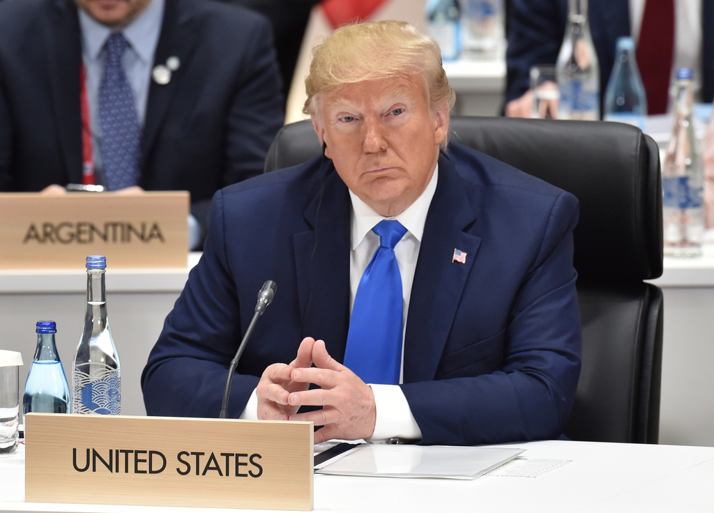 FILE - U.S. President Donald Trump attends a session at the G-20 Summit in Osaka on June 29, 2019. (Kazuhiro Nogi/Pool Photo via AP, File)
