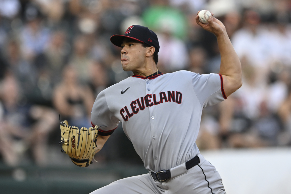 Cleveland Guardians starter Joey Cantillo delivers a pitch during the first inning of a baseball game against the Chicago White Sox, Saturday, Aug. 9, 2025, in Chicago. (AP Photo/Paul Beaty)