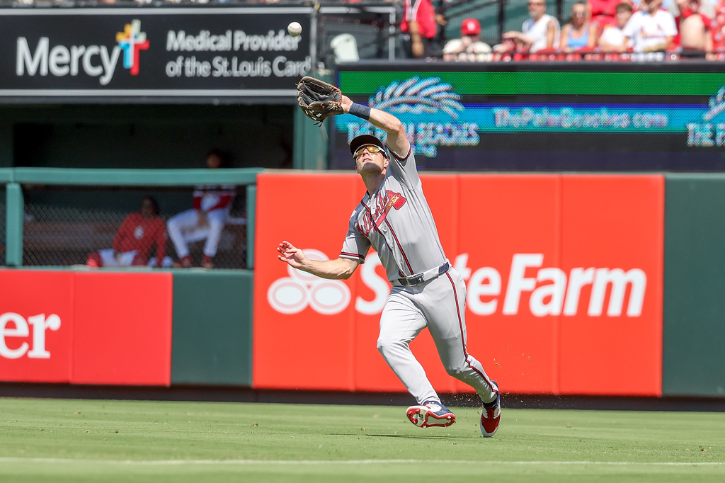 Atlanta Braves' Brewer Hicklen catches a fly ball for an out against St. Louis Cardinals' Alec Burleson during the sixth inning of a baseball game Sunday, July 12, 2026, in St. Louis. (AP Photo/Scott Kane)