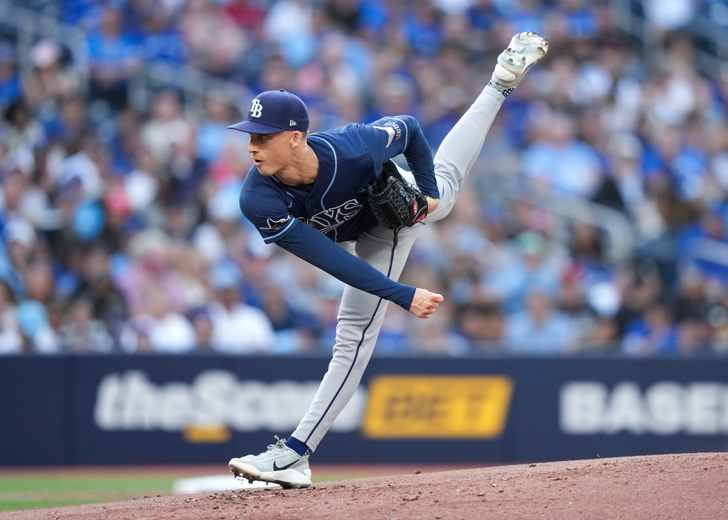 Tampa Bay Rays pitcher Griffin Jax (22) pitches against the Toronto Blue Jays during first inning of a baseball game in Toronto on Wednesday, July 22, 2026. (Nathan Denette/The Canadian Press via AP)
