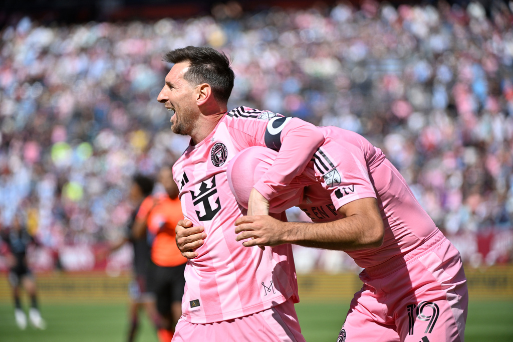 Inter Miami CF forwards Lionel Messi and Germán Berterame celebrate after a goal by Berterame in the first half of an MLS soccer game against the Colorado Rapids Saturday, April 18, 2026, in Denver. (AP Photo/Geneva Heffernan)