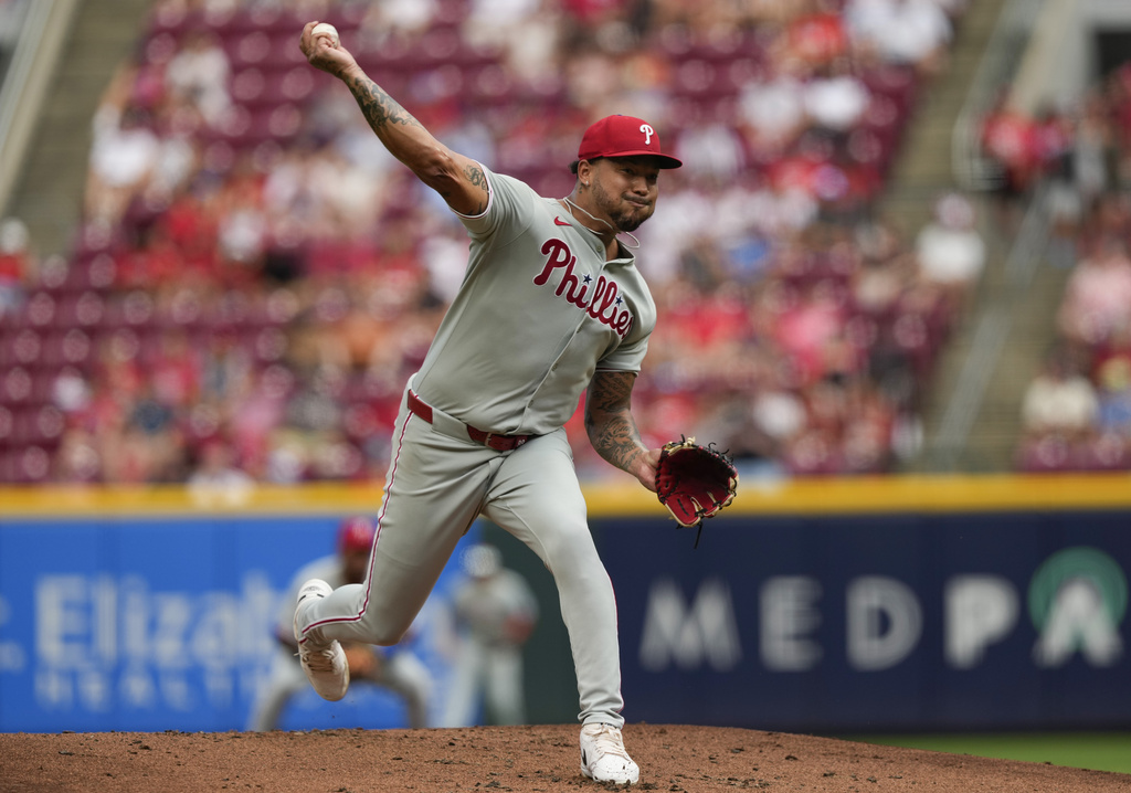 Philadelphia Phillies pitcher Taijuan Walker throws during the first inning of a baseball game against the Cincinnati Reds Monday, Aug. 11, 2025, in Cincinnati. (AP Photo/Carolyn Kaster)