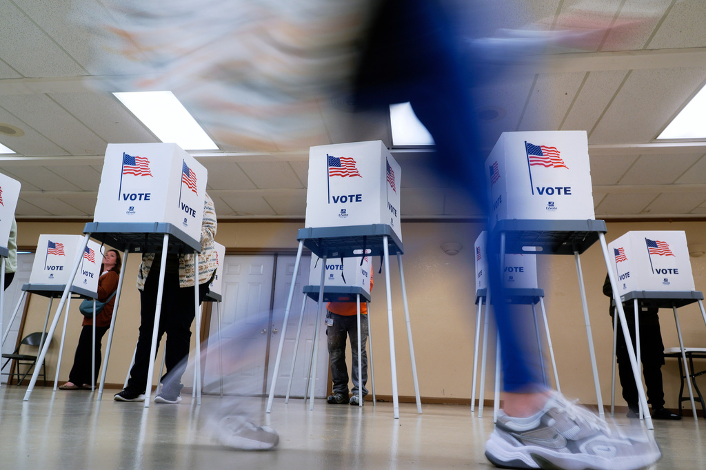 FILE - People vote in Oak Creek, Wis., on Nov. 5, 2024. (AP Photo/Morry Gash, File)