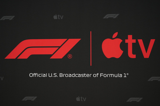 Apple and F1 logos are displayed at news conference where a five-year partnership between Formula 1 and Apple TV to bring races to Apple's streaming service beginning in 2026 was annoounced at the Circuit of the Americas in Austin, Texas, Friday, Oct. 17, 2025. (AP Photo/Eric Gay) Apple and F1 logos are displayed at news conference where a five-year partnership between Formula 1 and Apple TV to bring races to Apple's streaming service beginning in 2026 was annoounced at the Circuit of the Americas in Austin, Texas, Friday, Oct. 17, 2025. (AP Photo/Eric Gay)
