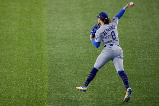 Los Angeles Dodgers' Enrique Hernández (8) throws to second to force out Toronto Blue Jays' Addison Barger to end Game 6 of baseball's World Series, Friday, Oct. 31, 2025, in Toronto. (AP Photo/Ashley Landis) Los Angeles Dodgers' Enrique Hernández (8) throws to second to force out Toronto Blue Jays' Addison Barger to end Game 6 of baseball's World Series, Friday, Oct. 31, 2025, in Toronto. (AP Photo/Ashley Landis)