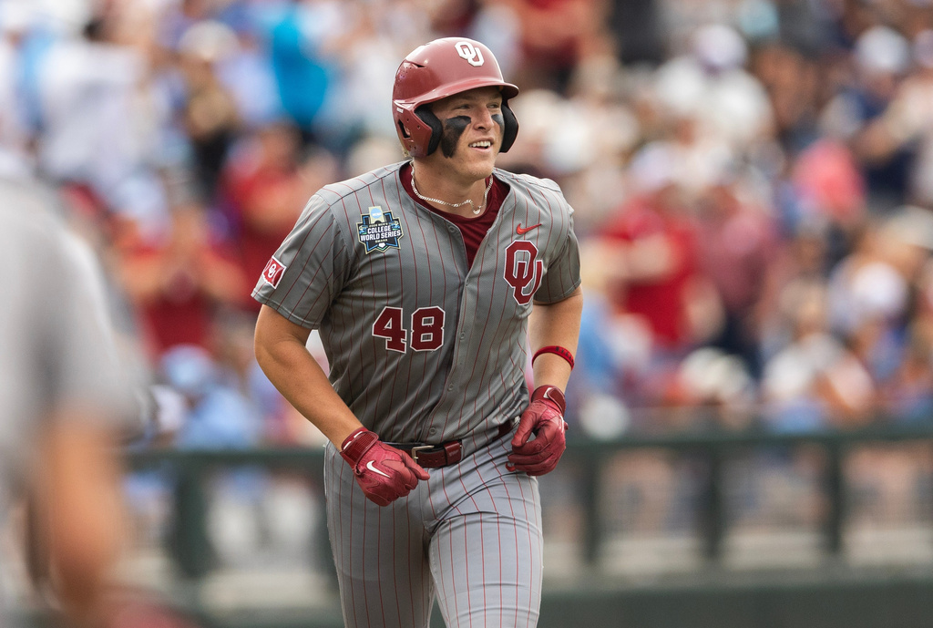 Oklahoma's Deiten Lachance (48) rounds the bases after hitting a two-run home run against North Carolina during the first inning in Game 1 of the NCAA College World Series baseball finals in Omaha, Neb., Saturday, June 20, 2026. (AP Photo/Rebecca S. Gratz)