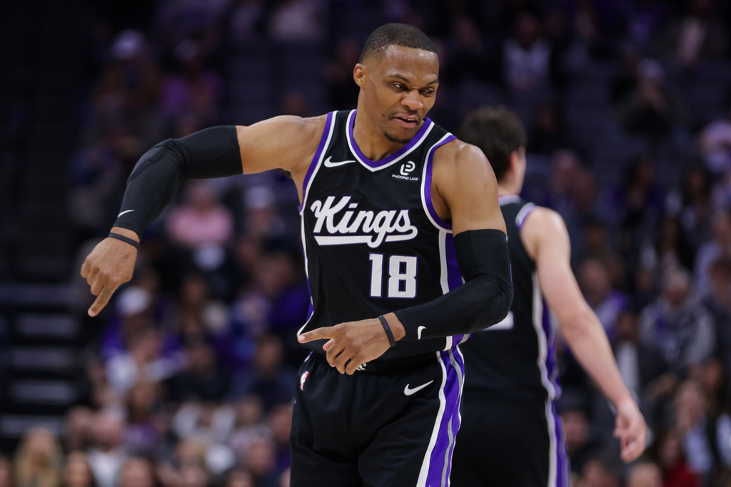Sacramento Kings guard Russell Westbrook (18) reacts after making a three point basket against the New Orleans Pelicans during the first half of an NBA basketball game Thursday, March 5, 2026, in Sacramento, Calif. (AP Photo/Scott Marshall)
