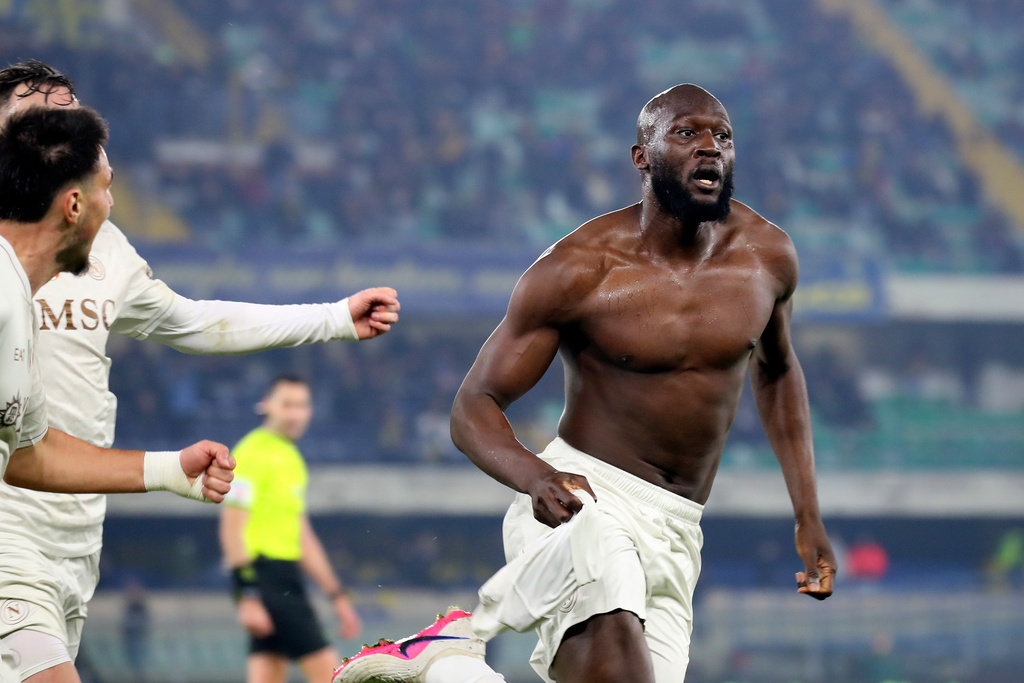 Napoli's Romelu Lukaku, right, celebrates after scoring his side's second goal during the Serie A soccer match between Hellas Verona and Napoli in Verona, Italy, Saturday, Feb. 28, 2026. (Paola Garbuio/LaPresse via AP)