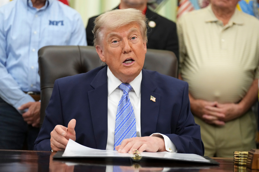 President Donald Trump speaks during an event about loosening a federal refrigerant rule, in the Oval Office at the White House, Thursday, May 21, 2026, in Washington. (AP Photo/Jacquelyn Martin)