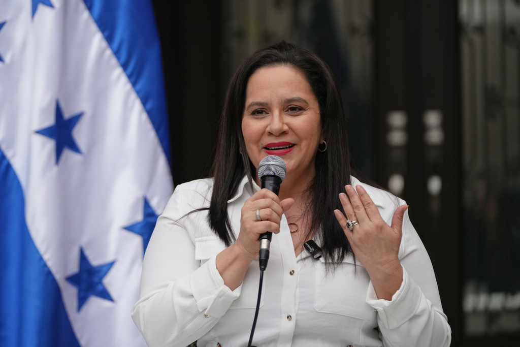 Ana Garcia, wife of former Honduras' President Juan Orlando Hernandez, speaks to journalists in Tegucigalpa, Honduras, Tuesday, Dec. 2, 2025. (AP Photo/Moises Castillo)