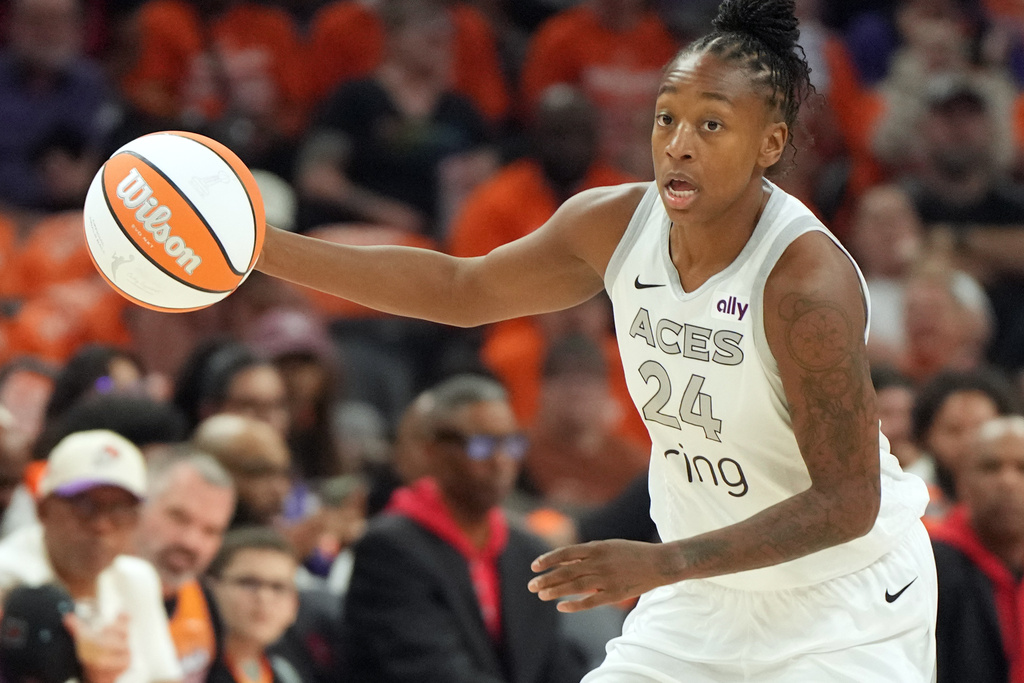 FILE - Las Vegas Aces guard Jewell Loyd (24) drives against the Phoenix Mercury during the first half of Game 3 of the WNBA basketball finals, Wednesday, Oct. 8, 2025, in Phoenix. (AP Photo/Rick Scuteri, File)