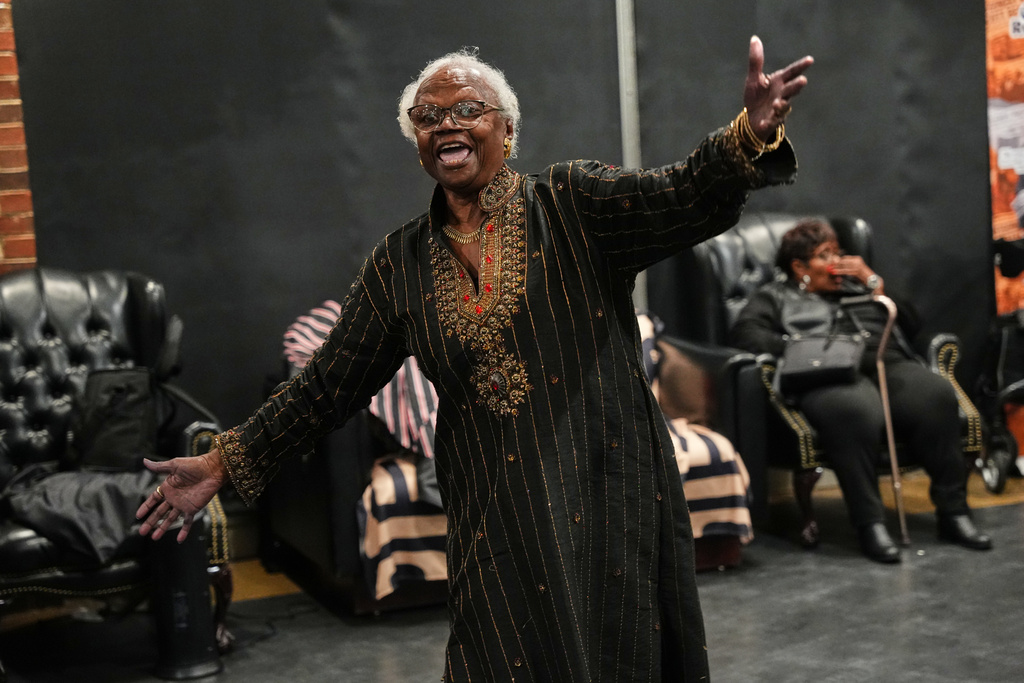 Jamila Jones, sister of Doris Crenshaw and who passed out pamphlets alongside Rosa Parks, sings during a "family reunion" to commemorate the 70th anniversary of the Montgomery Bus Boycott, Friday, Dec. 5, 2025, in Montgomery, Ala. (AP Photo/Olivia Bowdoin)