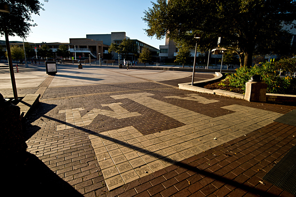 FILE - The sun sets over Texas A&M Campus, just outside Rudder Tower, Feb 12, 2016, in College Station, Texas. (Timothy Hurst/College Station Eagle via AP, File)