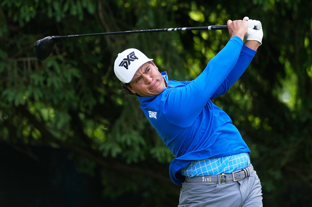 Aldrich Potgieter, of South Africa, watches his tee shot on the fourth hole during the first round of the PGA Championship golf tournament practice round at Aronimink Golf Club, Thursday, May 14, 2026, in Newtown Square, PA. (AP Photo/Matt Slocum)