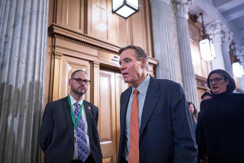 Sen. Mark Warner, D-Va.,, arrives for final votes as the Senate works to bring the longest government shutdown in U.S. history to an end after a bipartisan compromise, at the Capitol in Washington, Monday, Nov. 10, 2025. (AP Photo/J. Scott Applewhite)