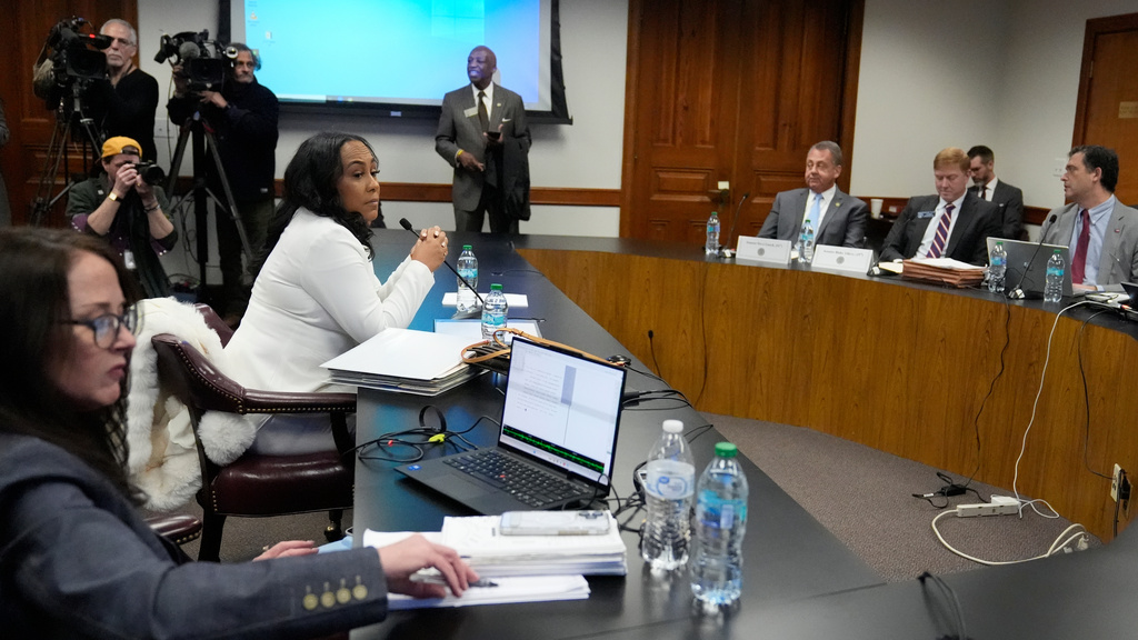 Fulton County District Attorney Fani Willis is seen at the Georgia State Capitol during questioning from a Georgia State Senate panel about her prosecution of President Donald Trump on Wednesday, Dec. 17, 2025, in Atlanta. (AP Photo/Brynn Anderson)