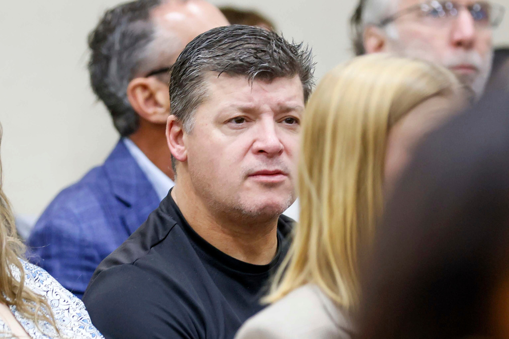 FILE - Jason Riley, center, Laken Riley's father, listens during the Jose Ibarra trial at Athens-Clarke County Superior Court on Monday, Nov. 18, 2024, in Athens, Ga. (Miguel Martinez/Atlanta Journal-Constitution via AP, Pool, File)