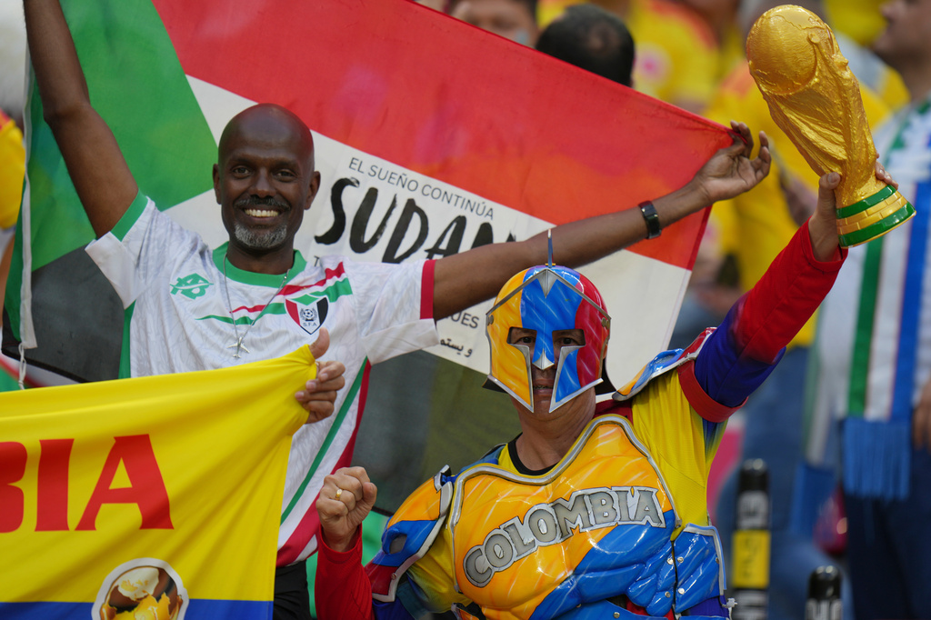 Fans cheer before the World Cup Group K soccer match between Uzbekistan and Colombia in Mexico City, Wednesday, June 17, 2026. (AP Photo/Eduardo Verdugo)
