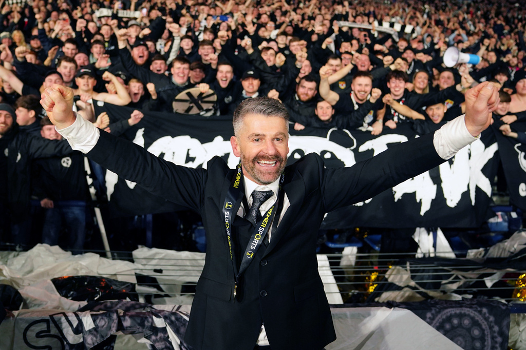 St Mirren manager Stephen Robinson celebrates after the final whistle of the Scottish Premier Sports Cup final against Celtic, in Glasgow, Scotland, Sunday, Dec. 14, 2025. (Jane Barlow/PA via AP)