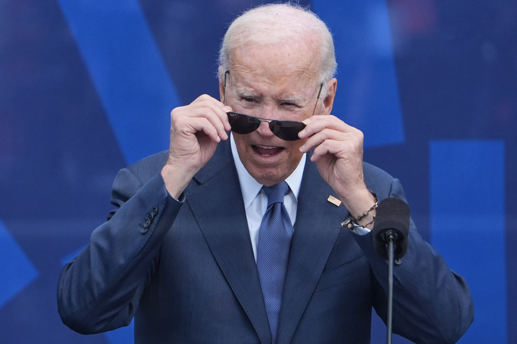 FILE - Former President Joe Biden looks out at the crowd during the dedication ceremony for the Obama Presidential Center, June 18, 2026, in Chicago. (AP Photo/Jeff Roberson, File)