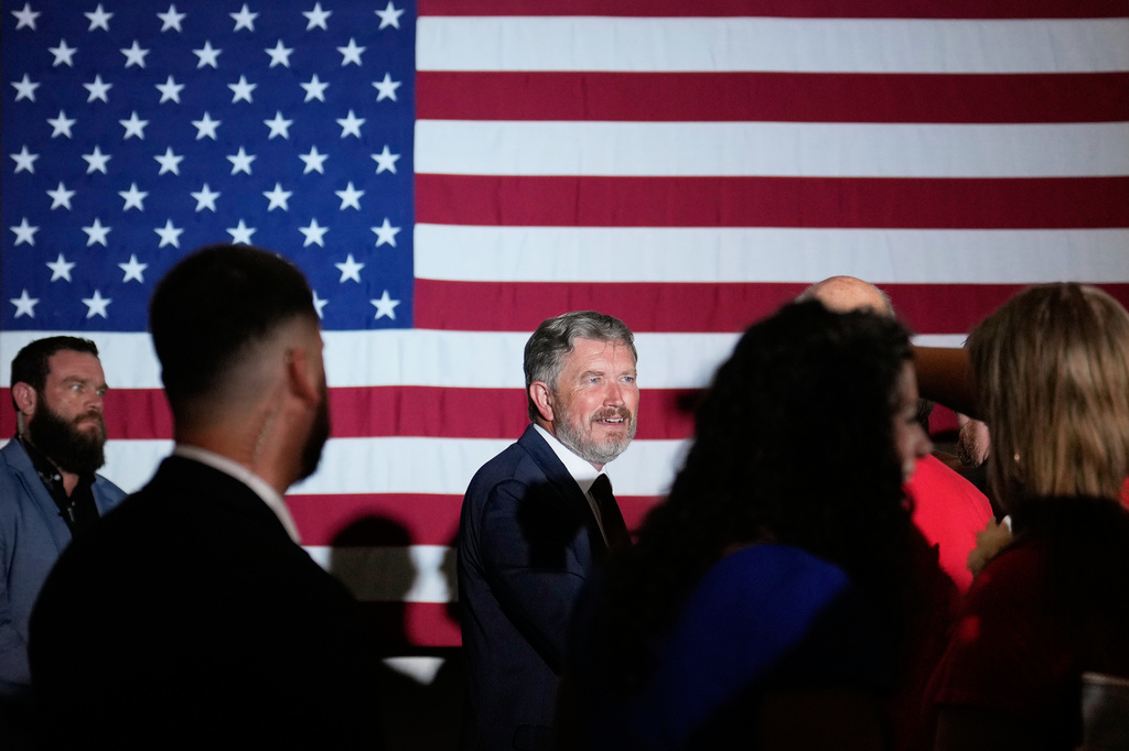 Rep. Thomas Massie, R-Ky., speaks with attendees during an election night watch party after losing the Republican party's nomination at the Marriott Cincinnati Airport, Tuesday, May 19, 2026, in Hebron, Ky. (AP Photo/Carolyn Kaster)