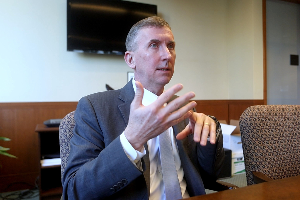 In this image made from video, former immigration judge and current First Assistant United States Attorney Charles Neil Floyd speaks during an interview, Feb. 6, 2026, at the Western District of Washington offices in Seattle. (AP Photo/Cedar Attanasio)