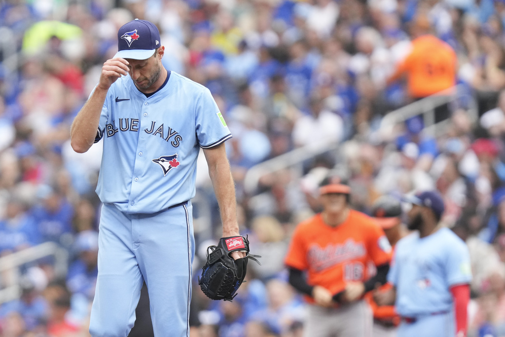 Toronto Blue Jays pitcher Max Scherzer (31) reacts as he stands on the mound during the second inning of a baseball game against the Baltimore Orioles, Saturday, Sept. 13, 2025, in Toronto. (Chris Young/The Canadian Press via AP)