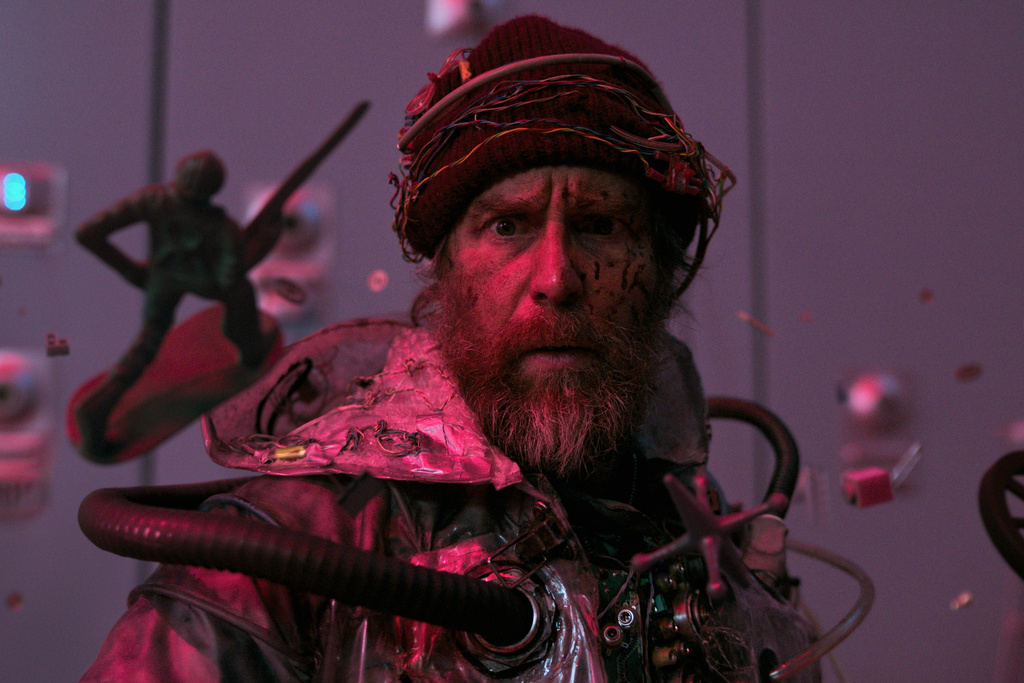 This image released by Briarcliff Entertainment shows Sam Rockwell in a scene from "Good Luck, Have Fun, Don't Die." (Briarcliff Entertainment via AP)