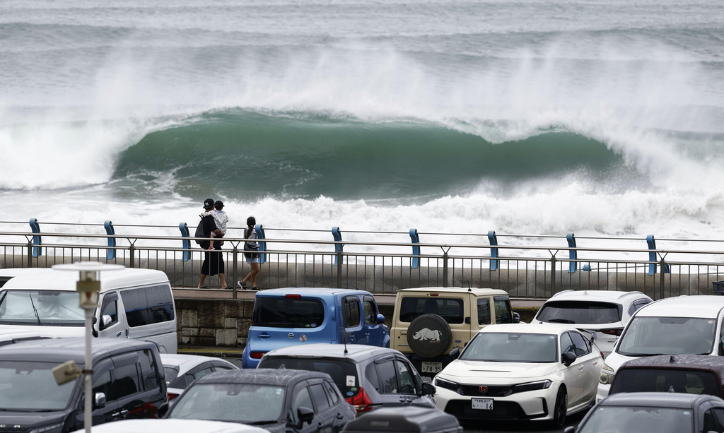 High waves caused by Tropical Storm Chan-hom crash near the shore in Oarai, Ibaraki prefecture, Japan Tuesday, Aug. 11, 2026. (/Kyodo News via AP)
