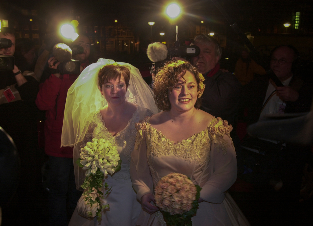 FILE -Helene Faasen, left, and Anne-Marie Thus, who were among four couples to get married under the world's first law allowing same-sex marriages with equal rights. arrive at Amsterdam's City Hall early April 1, 2001. (AP Photo/Peter Dejong, File)