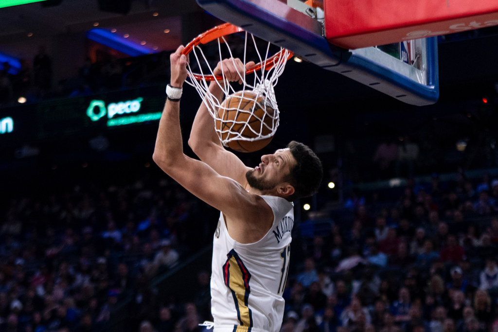 New Orleans Pelicans' Karlo Matkovic dunks the ball during the first half of an NBA basketball game against the Philadelphia 76ers, Saturday, Jan. 31, 2026, in Philadelphia. (AP Photo/Chris Szagola)