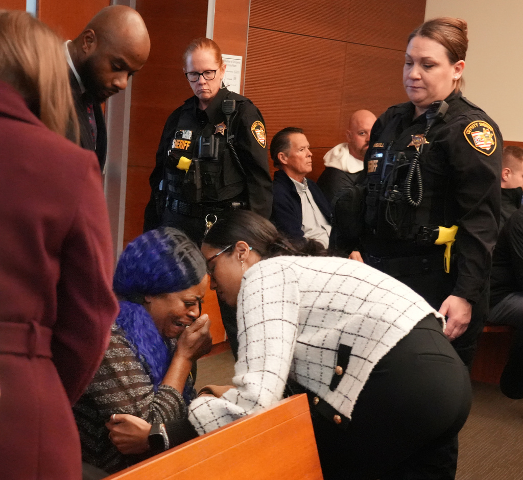 Ta'Kiya Young's grandmother, Nadine Young, reacts as the verdict is read in the trial of Blendon Township police officer Connor Grubb, who was found not guilty in the on-duty death of her daughter at Franklin County Common Pleas Court in Columbus, Ohio on Friday, Nov. 21, 2025. (Doral Chenoweth/The Columbus Dispatch via AP, Pool)