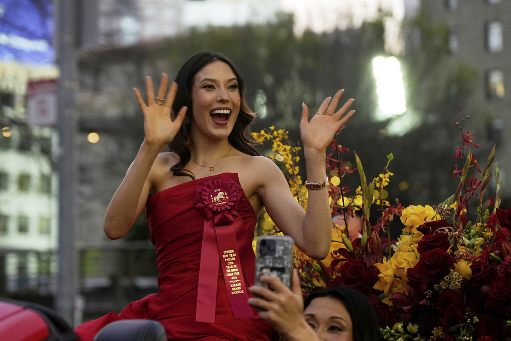 Olympic gold medalist and Grand Marhsal Eileen Gu waves during the Chinese New Year Parade in San Francisco, Saturday, March 7, 2026. (AP Photo/Jeff Chiu)