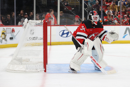 New Jersey Devils goaltender Jake Allen sits in the goal during the first period of an NHL hockey game against the San Jose Sharks, Friday, Oct. 24, 2025, in Newark, N.J. (AP Photo/Pamela Smith) New Jersey Devils goaltender Jake Allen sits in the goal during the first period of an NHL hockey game against the San Jose Sharks, Friday, Oct. 24, 2025, in Newark, N.J. (AP Photo/Pamela Smith)