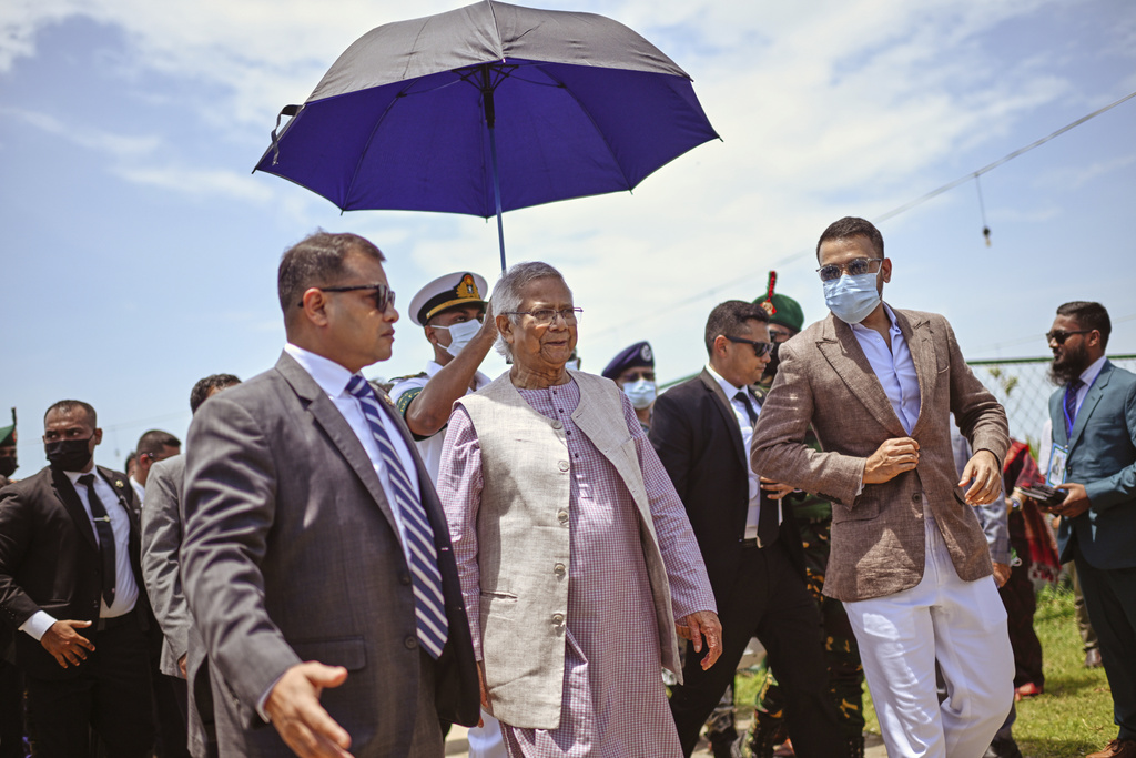 Chief Adviser Professor Muhammad Yunus, a Nobel Peace Prize laureate, leaves after attending a stakeholders' dialogue on the Rohingya situation in Cox's Bazar, Bangladesh, on Monday, Aug. 25, 2025. (AP Photo/Mahmud Hossain Opu)