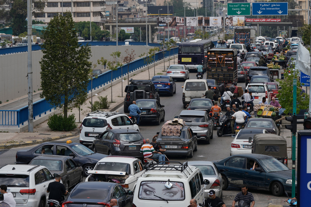 Cars sit in traffic on a highway as residents flee following an Israeli threat to strike Dahiyeh, Beirut's southern suburbs, Lebanon, Monday, June 1, 2026. (AP Photo/Bilal Hussein)
