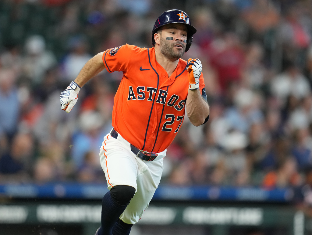 Houston Astros' Jose Altuve runs up the line on his home run off Atlanta Braves starting pitcher Martin Perez during the fourth inning of a baseball game, Sunday, Sept. 20, 2026, in Houston. (AP Photo/Karen Warren)