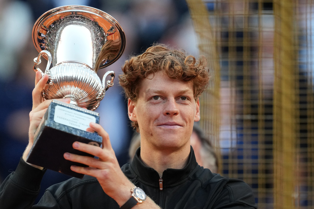 Jannik Sinner, of Italy, holds his trophy after defeating Casper Ruud, of Norway, 6/4, 6/4 in the final match to win the Italian Open tennis tournament, in Rome, Sunday, May 17, 2026. (AP Photo/Andrew Medichini)