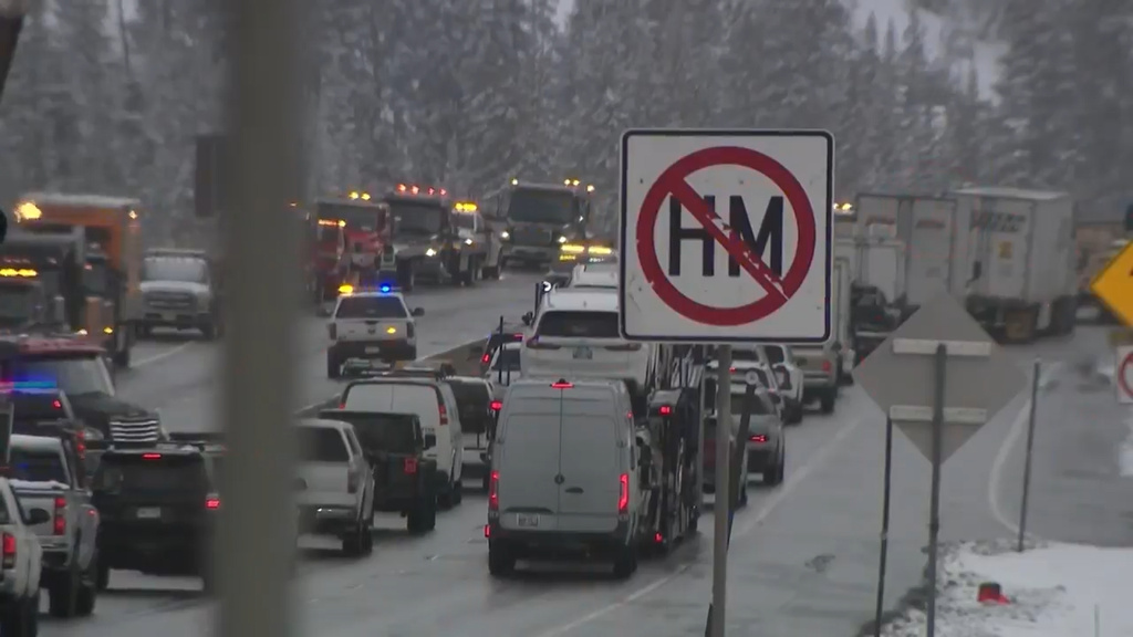 This grab from video shows traffic backed up after a multi-vehicle pile up on a section of a snowy highway in Clear Creek County, Colorado, Tuesday, April 14, 2026. (KMGH/Denver7 via AP)