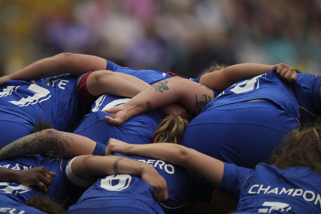 French players enter the scrum during the Women's Rugby World Cup 2025 semifinal match between France and England in Bristol, England, Saturday, Sept. 20, 2025.(AP Photo/Alastair Grant)