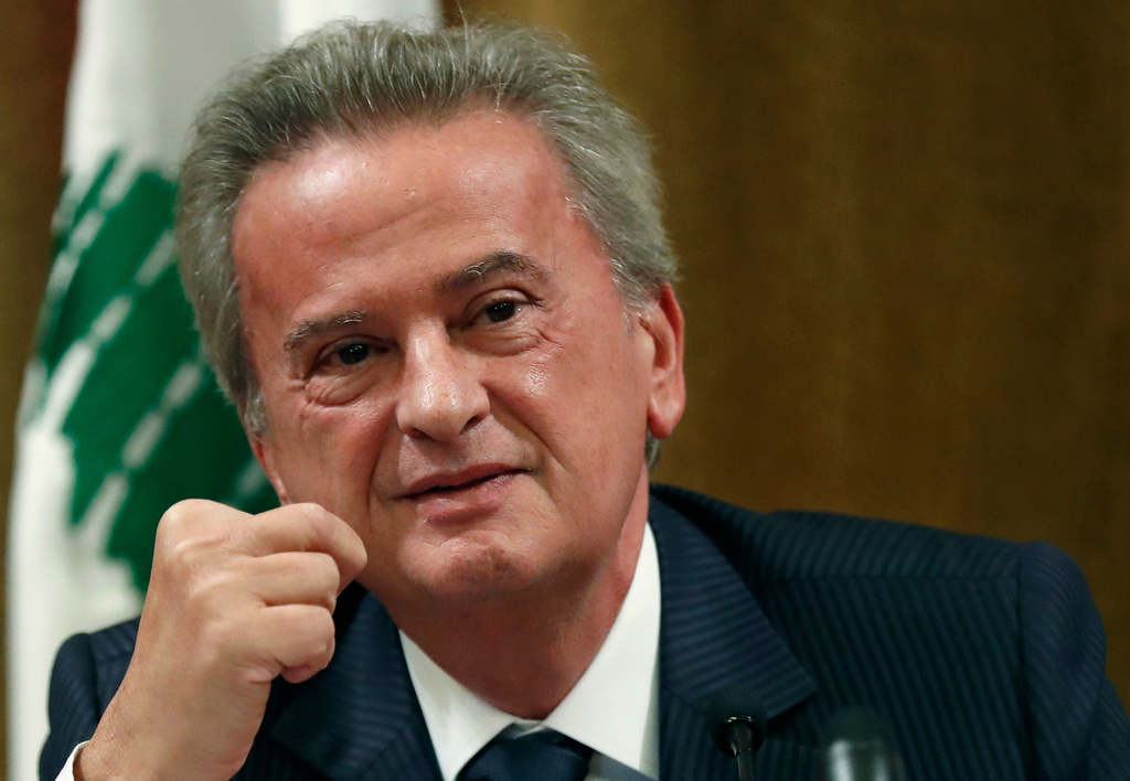 FILE - Riad Salameh, Lebanon's Central Bank governor, smiles during a press conference in Beirut, on Nov. 11, 2019. (AP Photo/Hussein Malla, File)