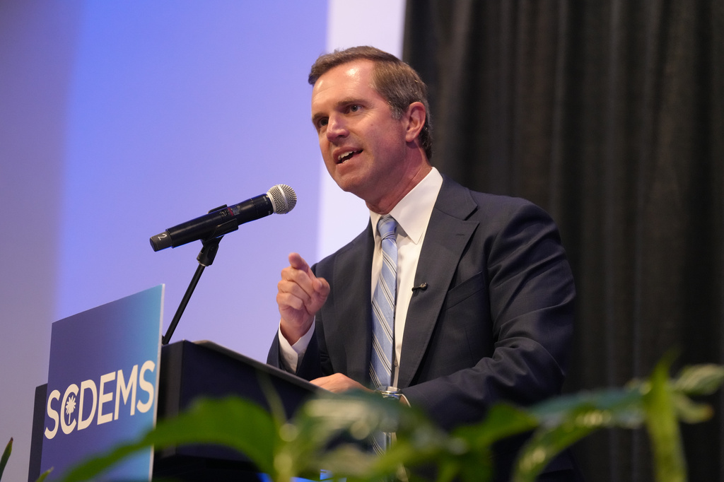 Democratic Gov. Andy Beshear of Kentucky speaks to attendees at the South Carolina Democratic Party's Blue Palmetto Dinner on Friday, May 29, 2026, in Columbia S.C. (AP Photo/Meg Kinnard)