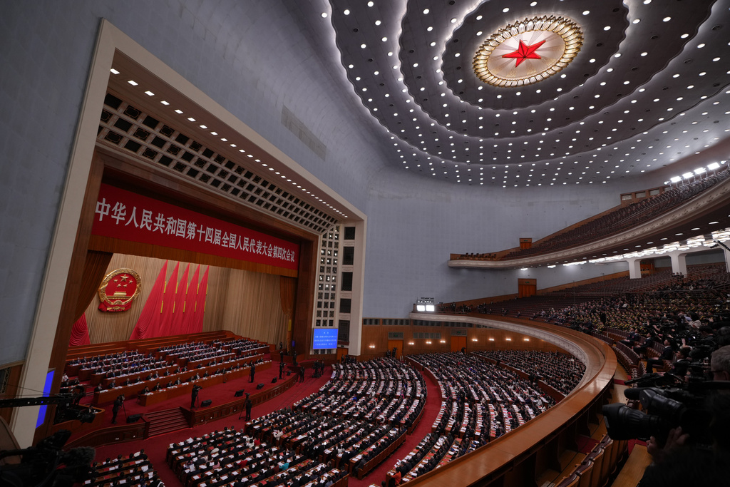 Leaders and delegates attend the closing session of the National People's Congress (NPC) at the Great Hall of the People, in Beijing, China, Thursday, March 12, 2026. (AP Photo/Andy Wong)