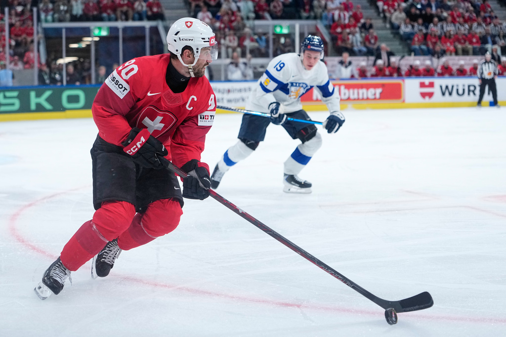 Switzerland's Roman Josi (90) in action during the 2026 IIHF Men's Ice Hockey World Championship final match between Switzerland and Finland, in Zurich, Switzerland, Sunday, May 31, 2026. (AP Photo/Darko Bandic)