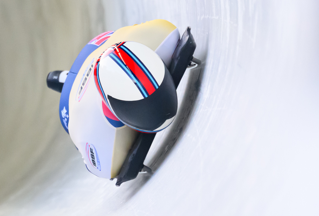 Britain's Matt Weston races down the track, during the men's single, 1st run of the Skeleton World Cup, in Altenberg, Germany, Friday, Jan. 16, 2026. (Robert Michael/dpa via AP)